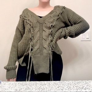 Green sweater oversized off the shoulder